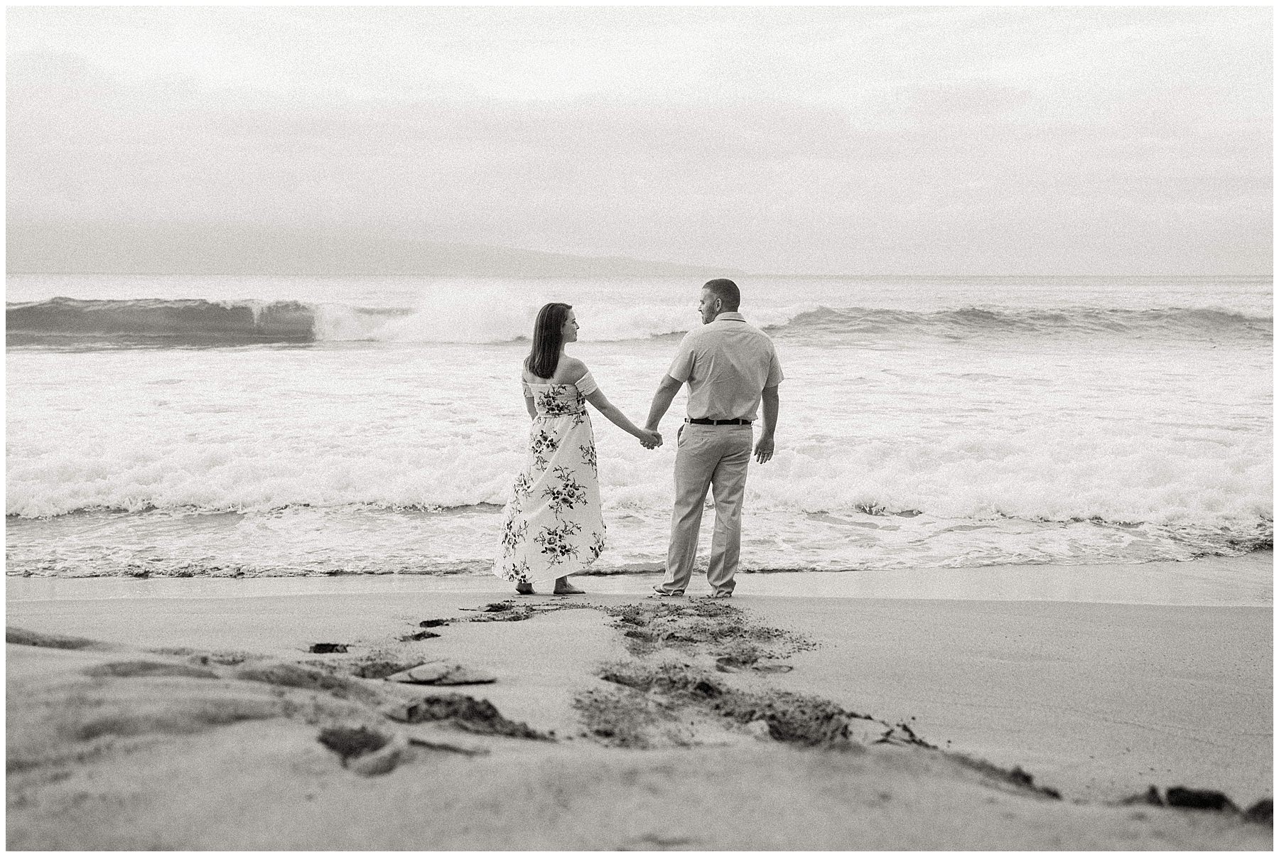 couple taking photos in west maui