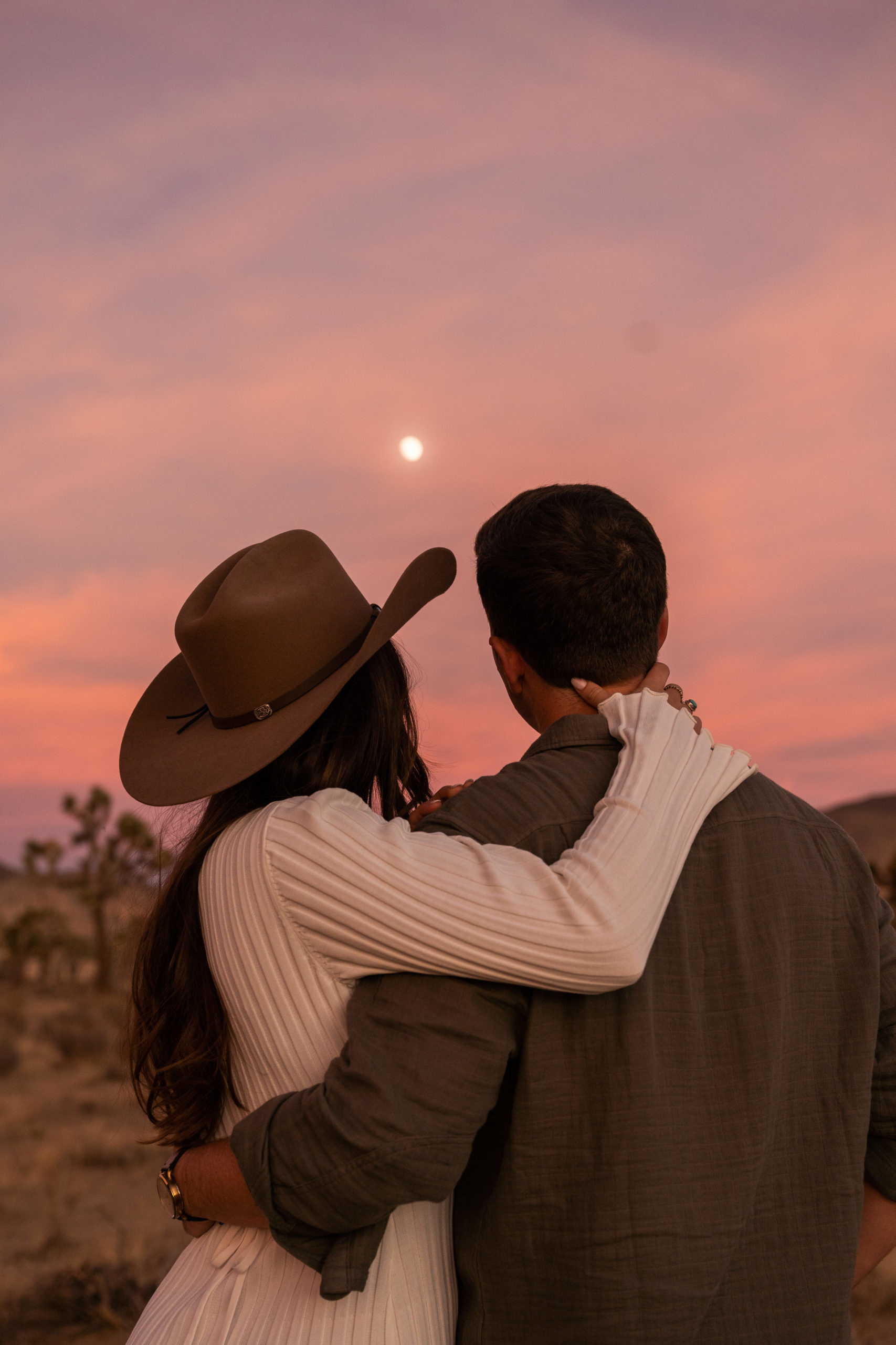 couple watching sunset in joshua tree national park